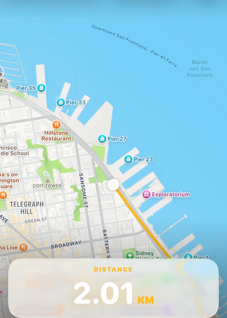 A run being tracked live: the route drawn on the map and a distance of 2.01 km.